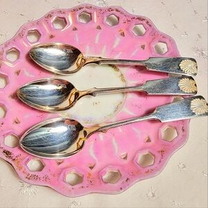 3 silver tea spoons with pink lace style and gold highlights tea saucer